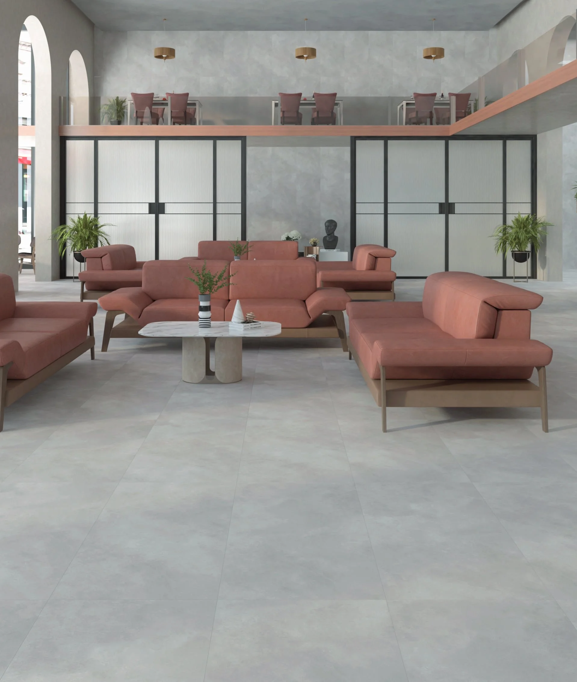 Modern lounge area with plush sofas and mezzanine.