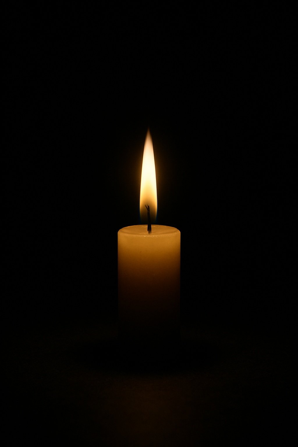 Solitary Candle Flame Dark Background Mobile Wallpaper