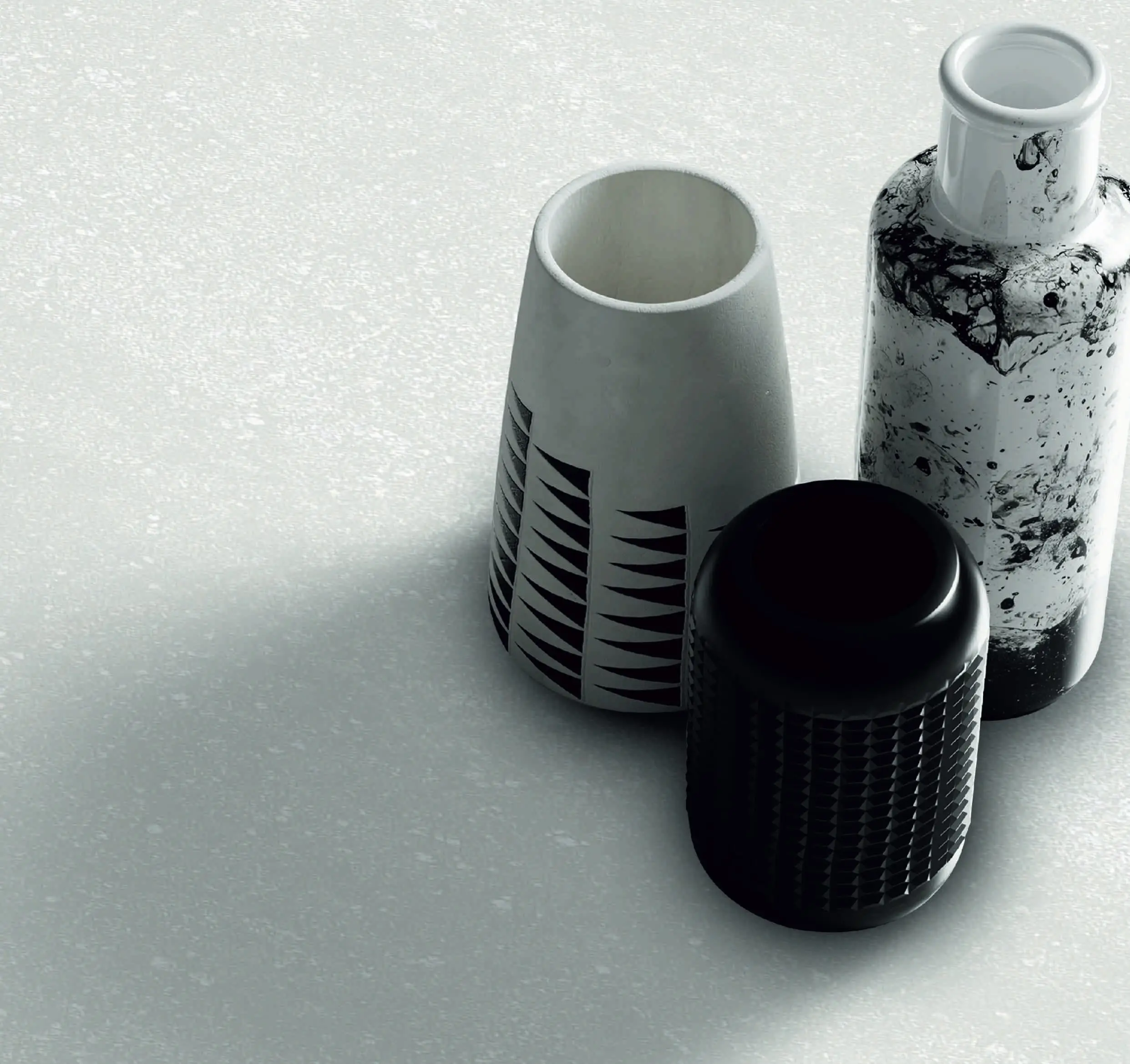 Three Stylish Vases with Monochromatic Patterns on a Minimal Background