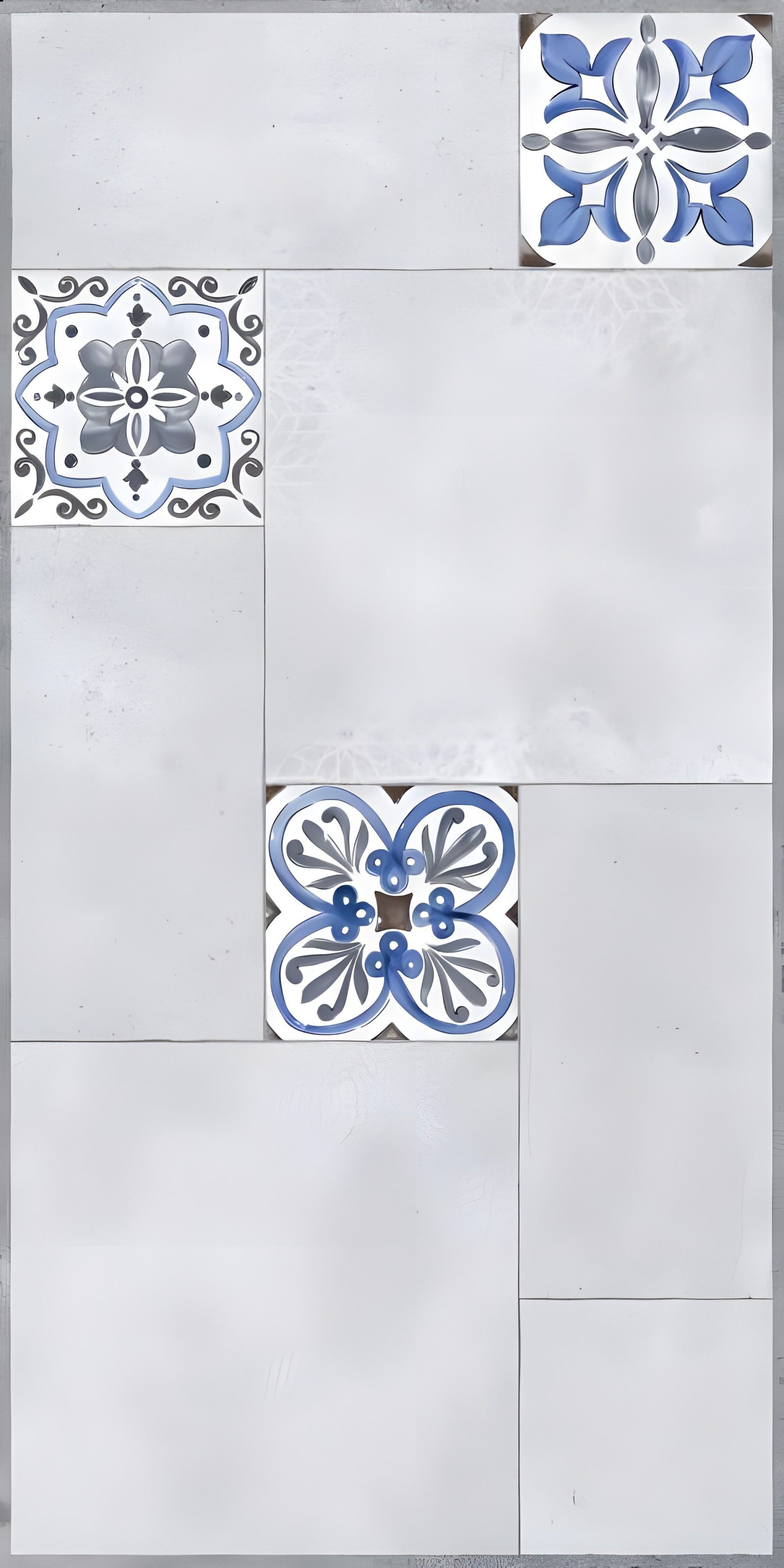 White Tile Layout with Blue Floral Inserts
