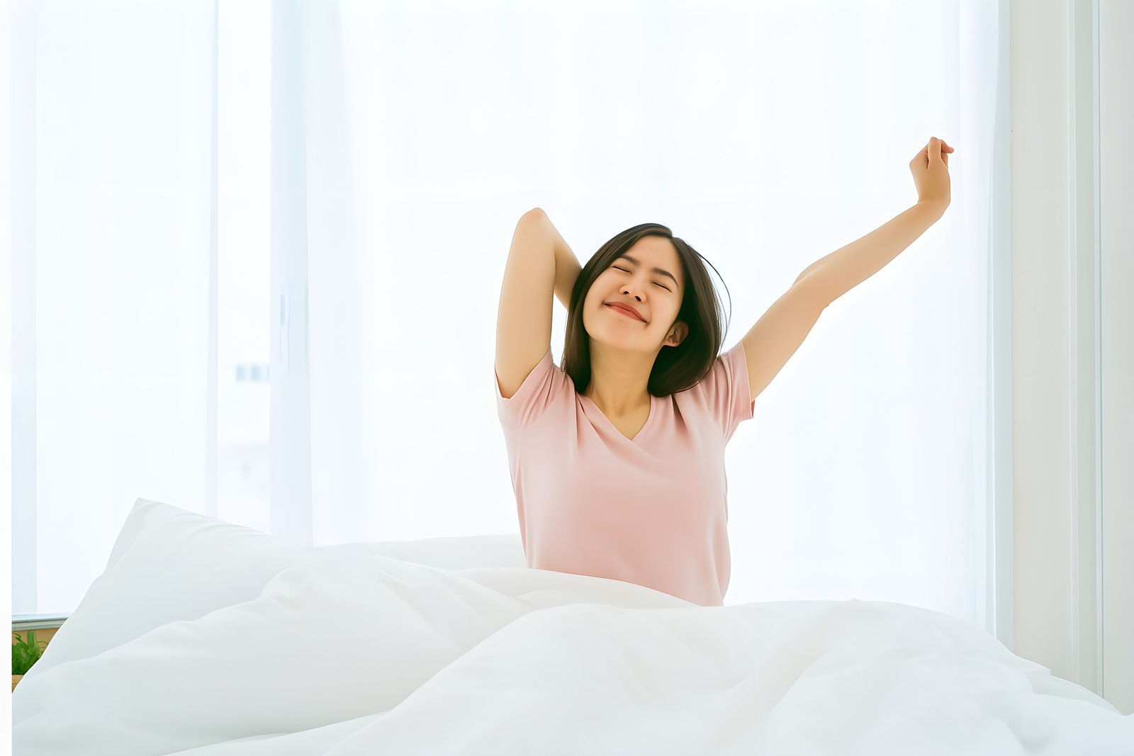 Young Woman Joyfully Stretching in a Bright Morning Setting